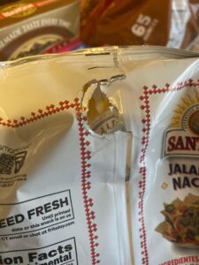 mouse biting chips bag